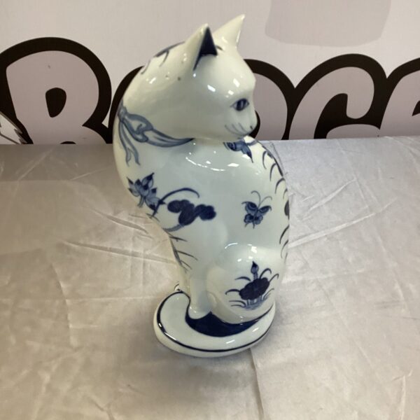 Detailed blue and white china cat figurine from Thailand.