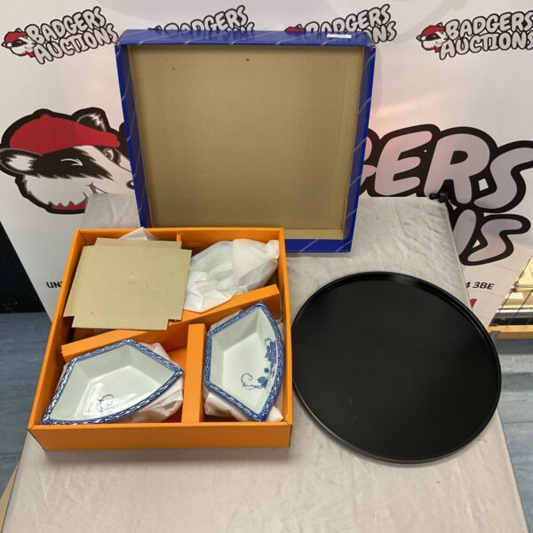 Blue and white china lazy susan on a table.