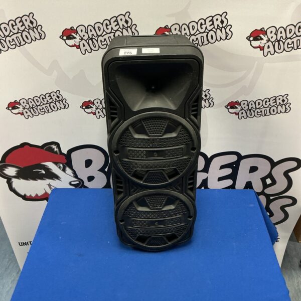 Black portable Bluetooth speaker for wireless audio playback.