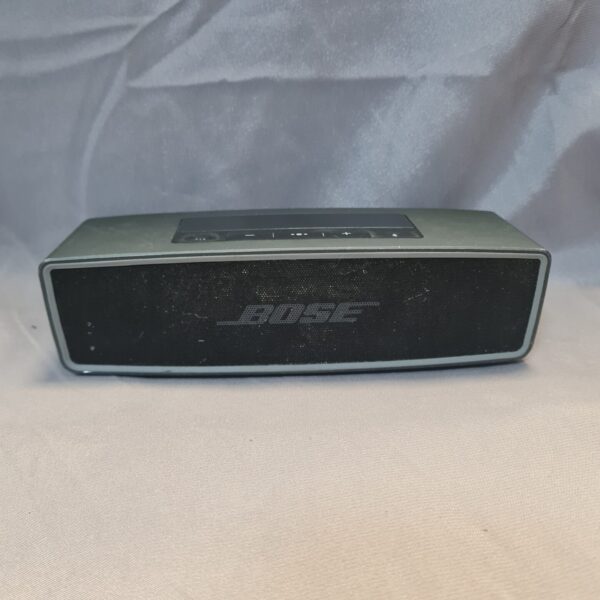 Black Bose Soundlink Mini II portable Bluetooth speaker on a white surface.