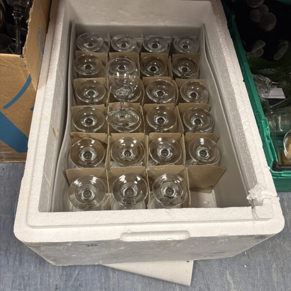 Box of twenty-four wine glasses in polystyrene packaging.