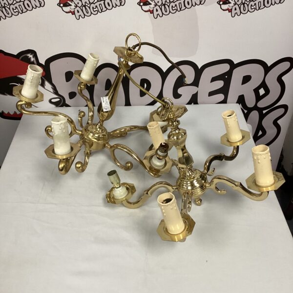 Ornate brass chandelier lights, a vintage pair for home decor.