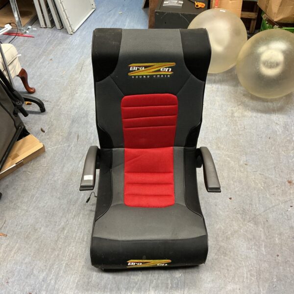 Front view of a black Brazen sound gaming chair.