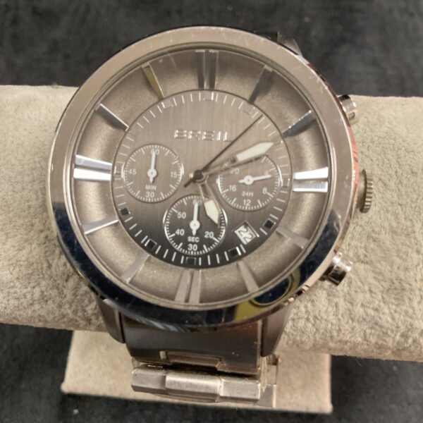 Silver Breil quartz wristwatch with stainless steel bracelet.