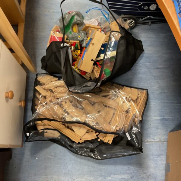 Large lot of Brio wooden train track pieces and accessories.