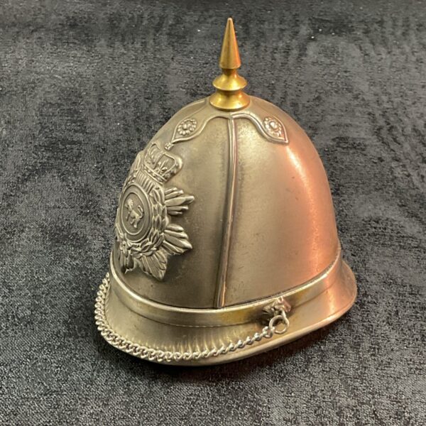 Vintage British Army helmet lighter with brass detailing.