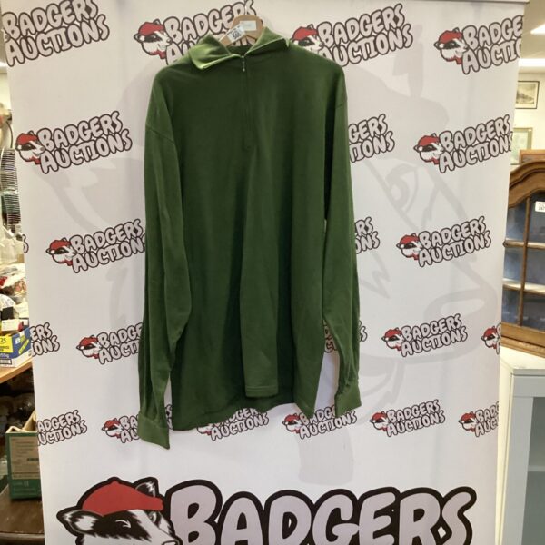 Front view of a British military arctic shirt with camouflage pattern.