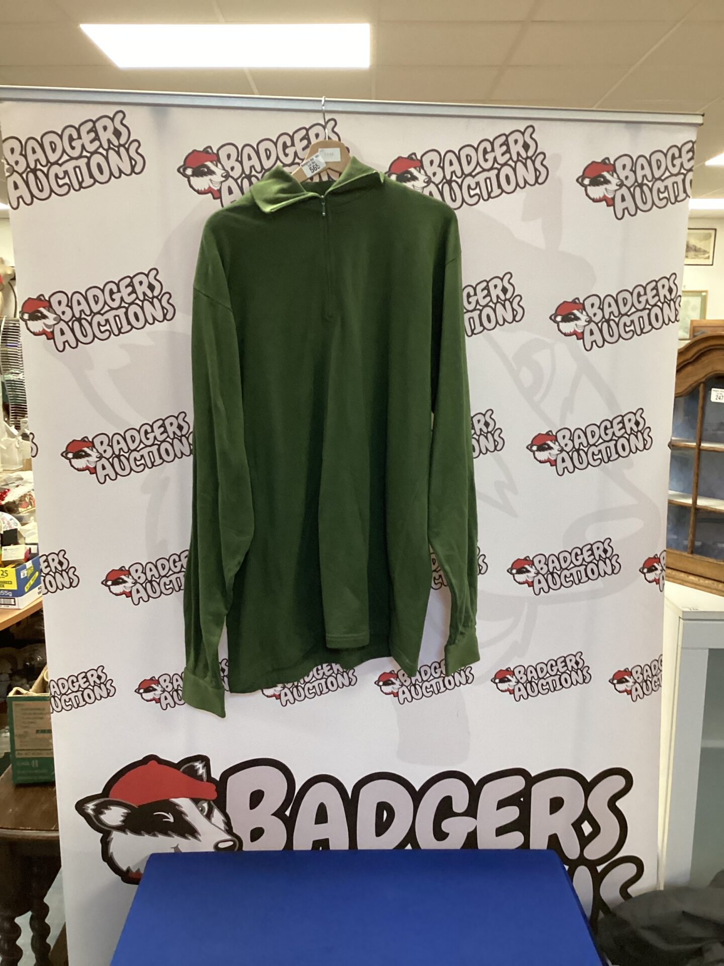 Front view of a British military arctic shirt with camouflage pattern.