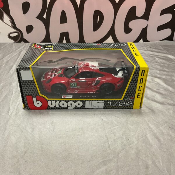 Burago Porsche 911 RSR diecast model car, detailed racing livery.