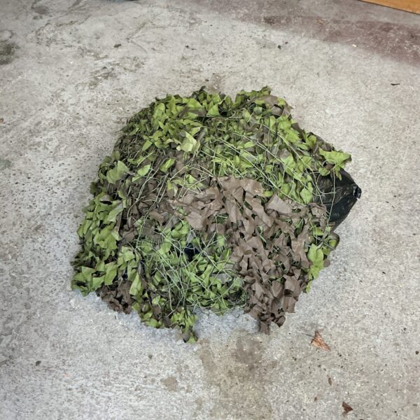 Quantity of camouflage netting for outdoor concealment.