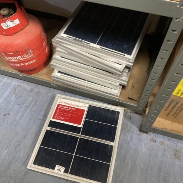 Lot of used CanadianSolar KUPower CS3K-P solar panels for renewable energy.