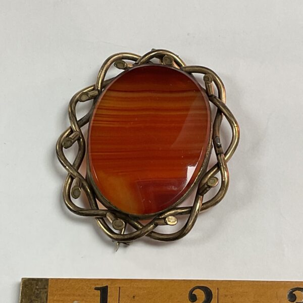 Vintage carnelian agate brooch with pinchbeck setting.
