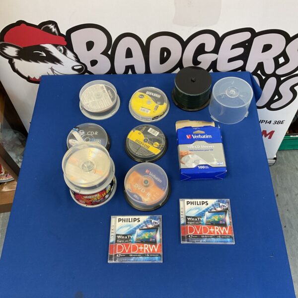 Lot of CD-R and DVD-R discs with protective sleeves for storage.