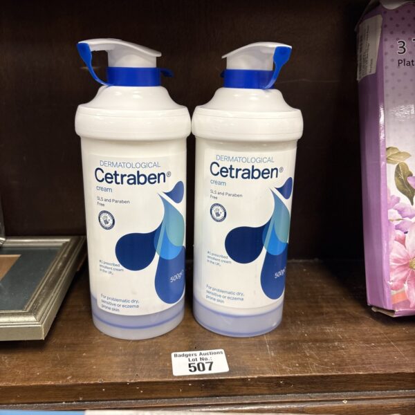 Two bottles of dermatological Cetraben cream for sensitive skin.