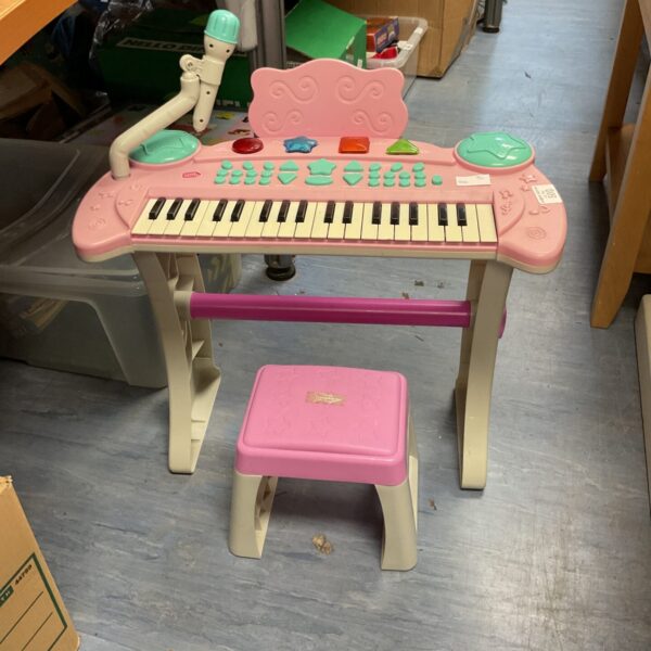 Pink Chad Valley childrens piano with stool, vintage toy keyboard.