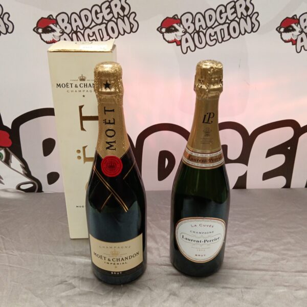 Sealed bottles of Moet & Chandon and Laurent Perrier champagne.