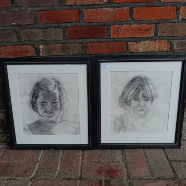 Vintage charcoal portrait of a child, artist signed, framed artwork.