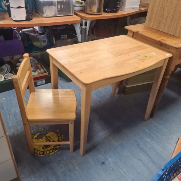 Vintage wooden childrens table and chair set for kids playroom.