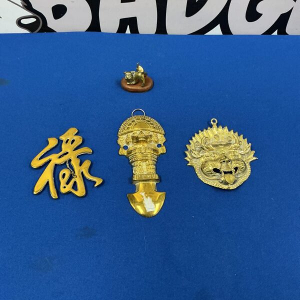 Antique Chinese dragon brass fitting with detailed relief work.