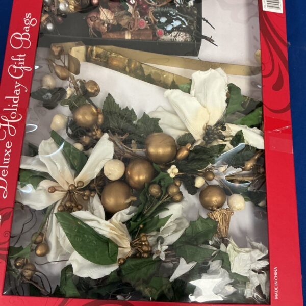 Vintage Christmas decorations box with colourful ornaments.