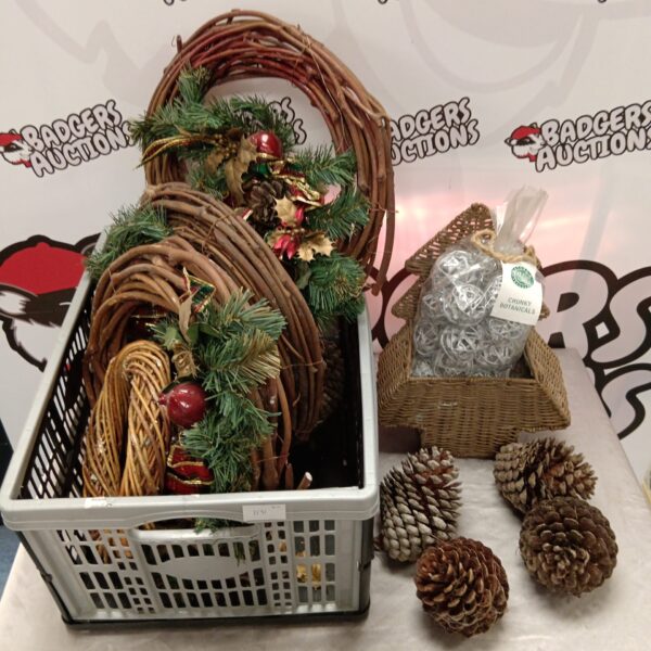 Christmas decorations lot featuring wreaths and pine cones.