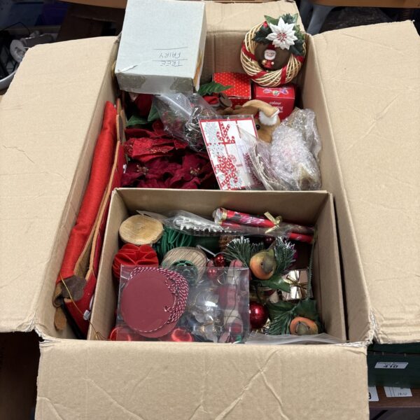 Mixed lot of colourful Christmas decorations and baubles.