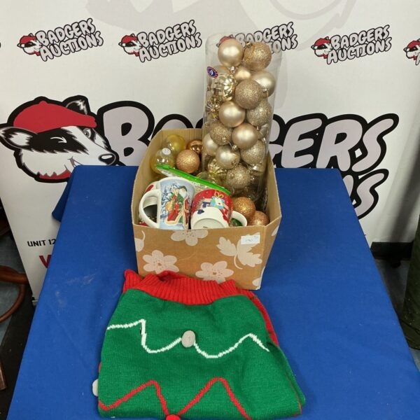 Christmas decorations and mugs in a gift box, festive holiday lot.