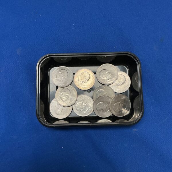 Lot of ten Churchill commemorative coins for collectors.