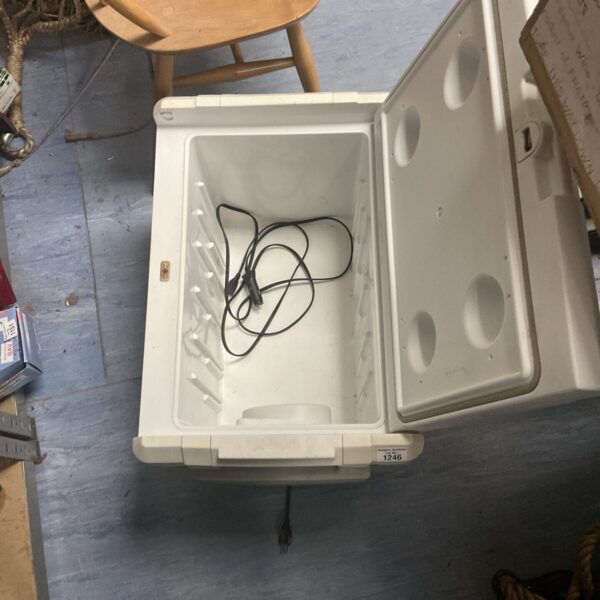 Used Coleman 12v fridge box with adapter lead for portable cooling.