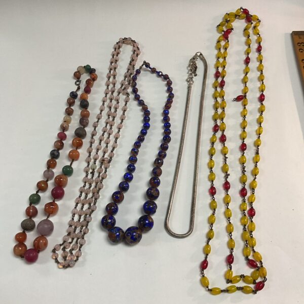 Lot of vintage coloured stone necklaces and snake link chain.