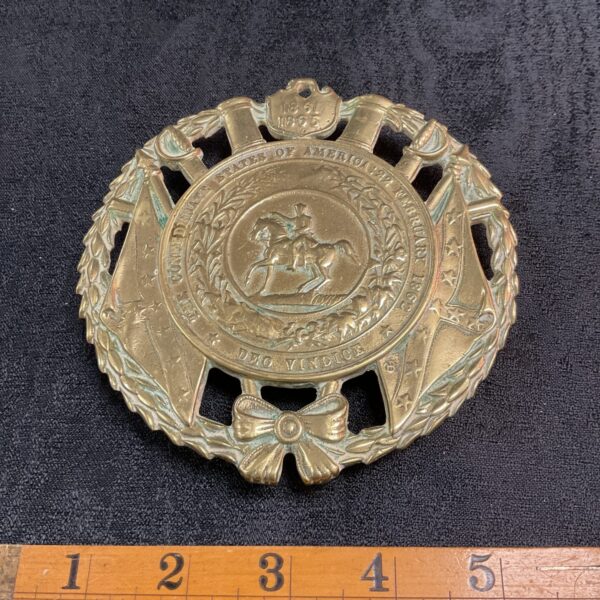 Antique Confederate States of America brass trivet with detailed seal.