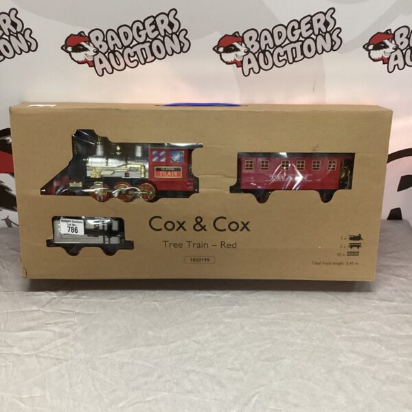 Red boxed Cox and Cox tree train set for Christmas decoration.