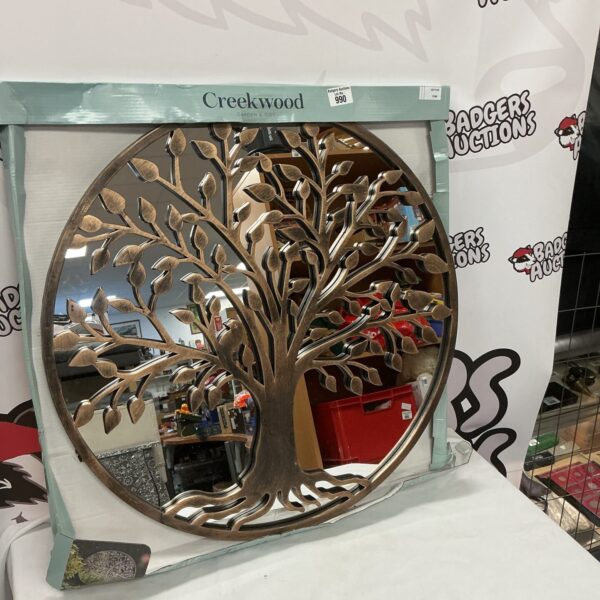 Ornate Creekwood decorative wall mirror for home decor.