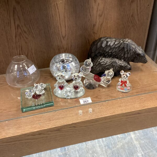Close-up of crystal teddy bear ornaments and wooden bears.