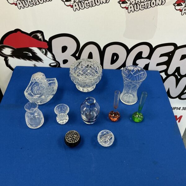 Collection of vintage crystal and glass vases and rose bowls.