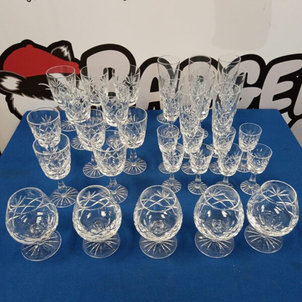 Elegant collection of vintage crystal wine and sherry glasses.