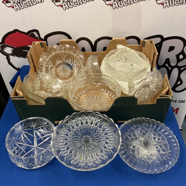 Collection of vintage cut glass cake stands and serving bowls.