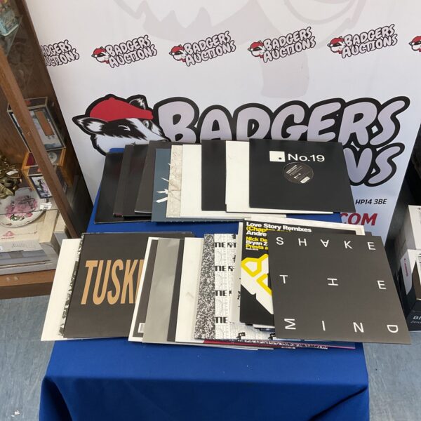 Lot of twelve dance vinyl records for collectors and DJs.