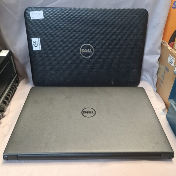 Black Dell laptop closed, showing the Dell logo.
