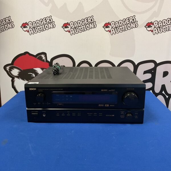 Black Denon AVR-3300 AV receiver, vintage audio equipment.