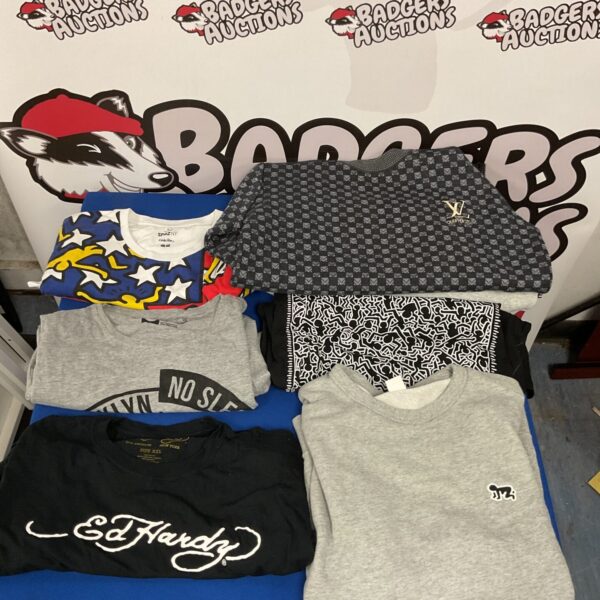 Designer clothing bundle featuring Keith Haring shirt and branded sweaters.