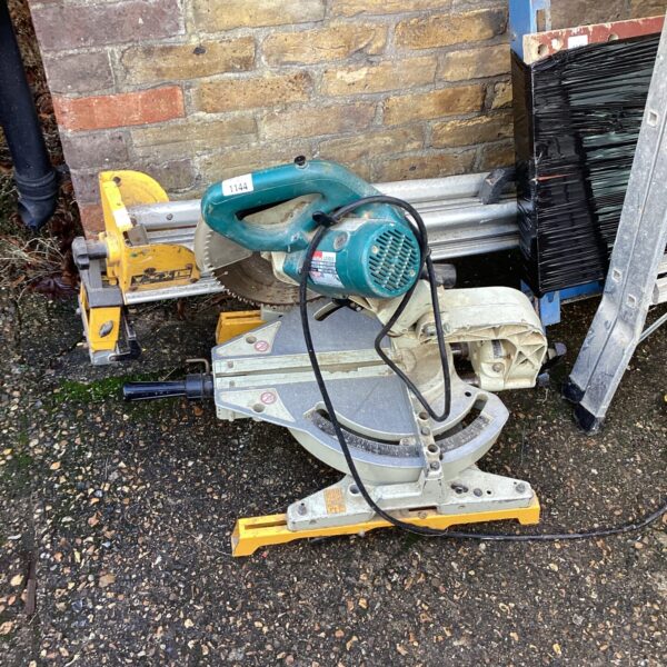 Dewalt mitre saw stand with Makita mitre saw attached.