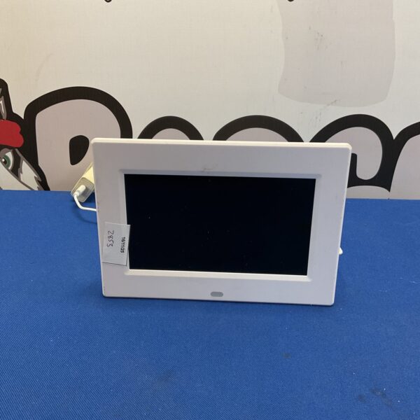 Front view of a vintage digital calendar day clock.