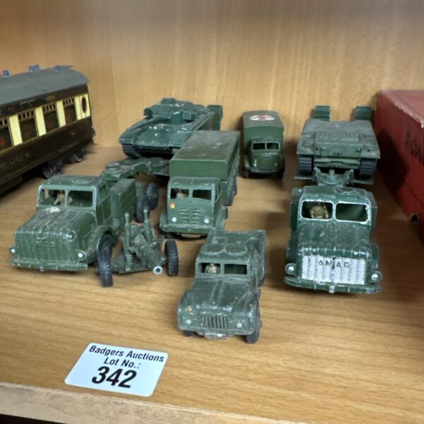 Vintage Dinky army diecast models in a lot.