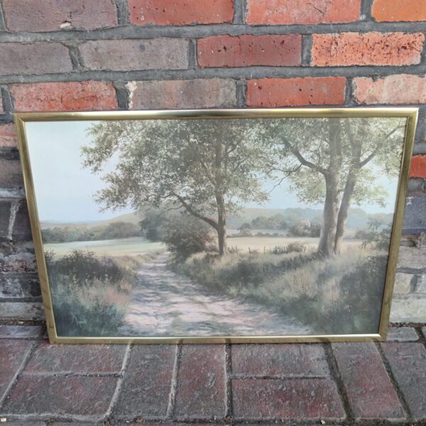 Vintage Dipnall country landscape print in a brass frame.