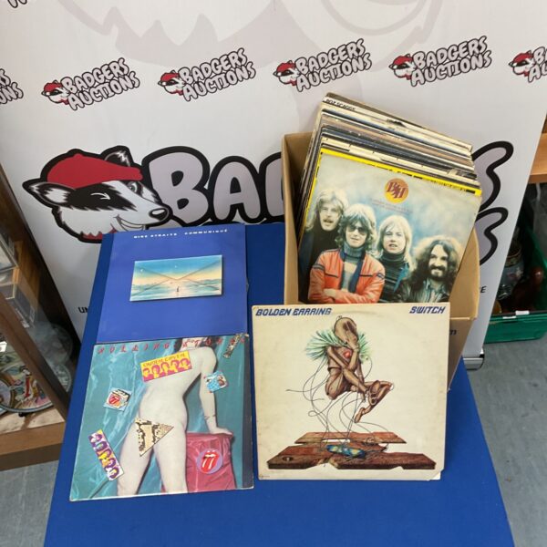 Collection of vintage Dire Straits vinyl LPs for collectors.