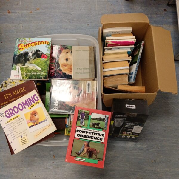 Vintage dog training and grooming books with Wahl clippers.