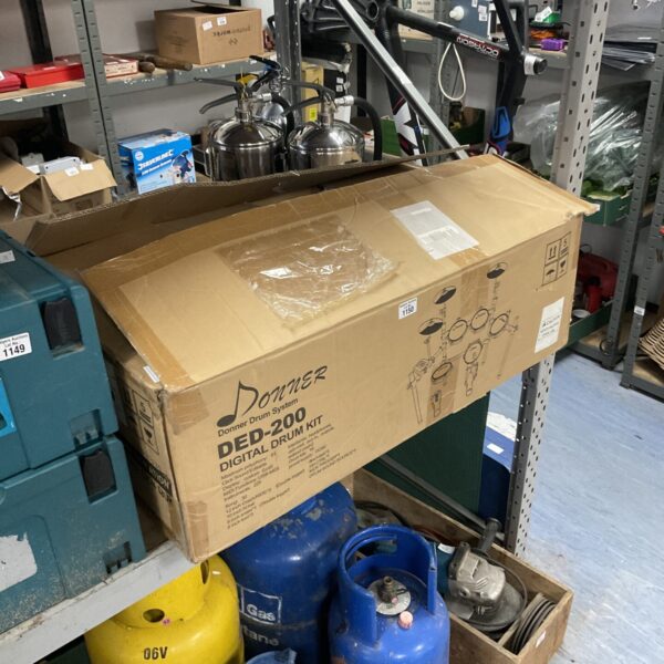 Donner DED-200 digital drum kit in original packaging.