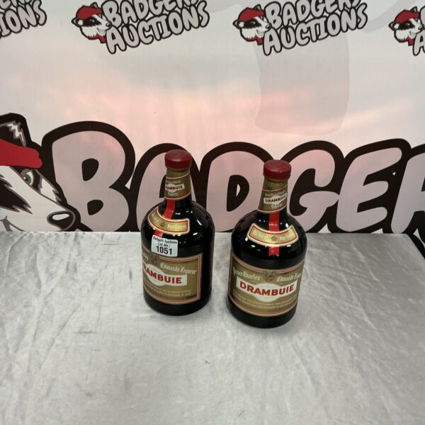 Vintage Drambuie bottles, collectible Scotch whisky liqueur.