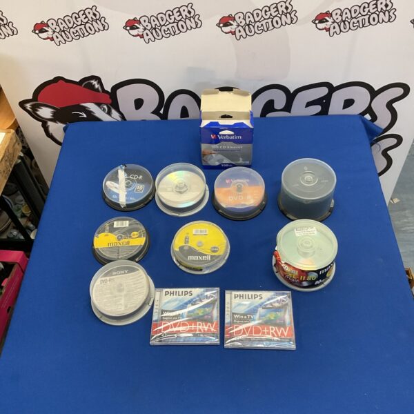 Lot of blank DVD-R and CD-R discs for data storage.